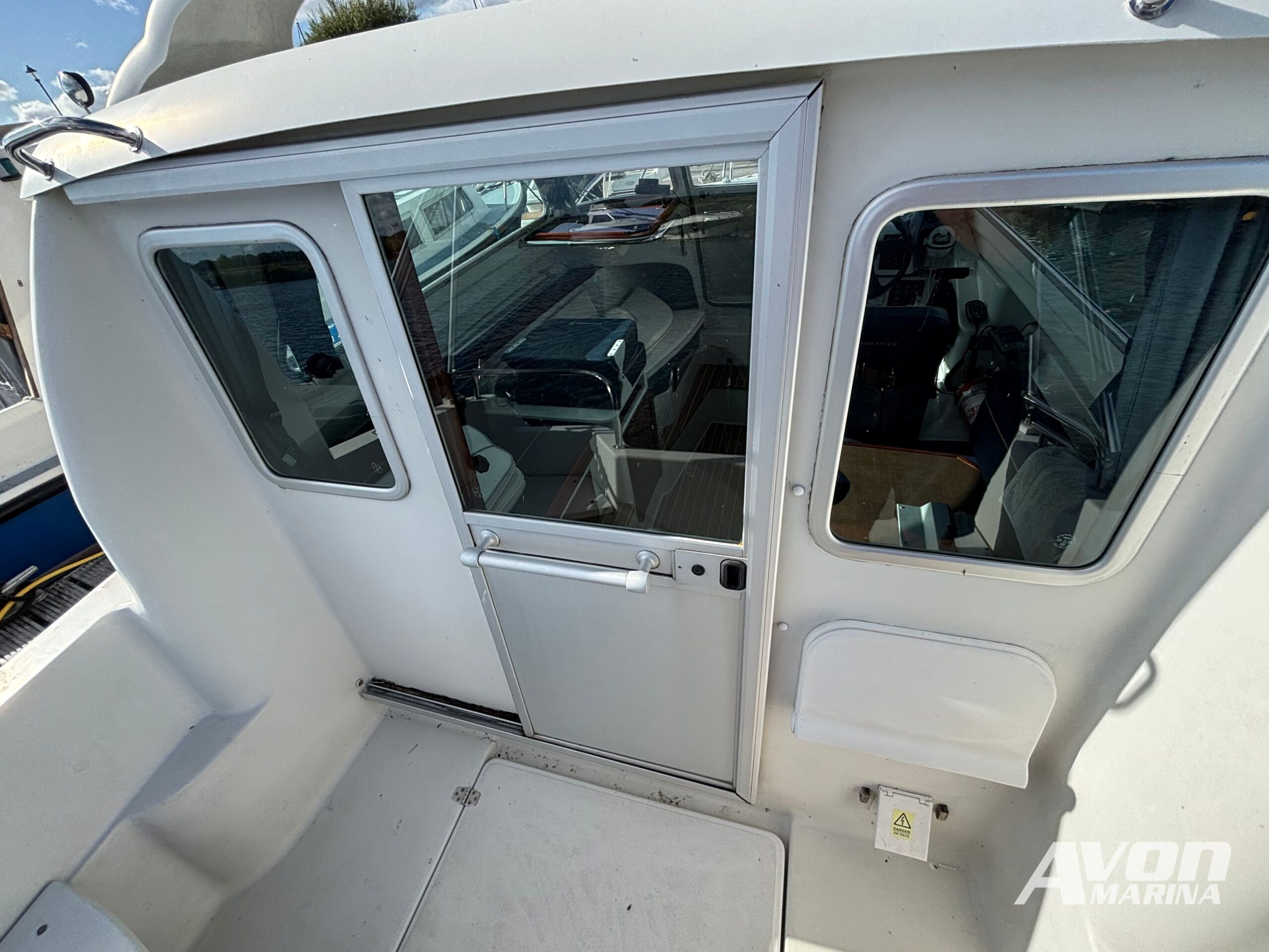 Finnmaster 6100MC | Evinrude 90hp | 2005 - Image 4